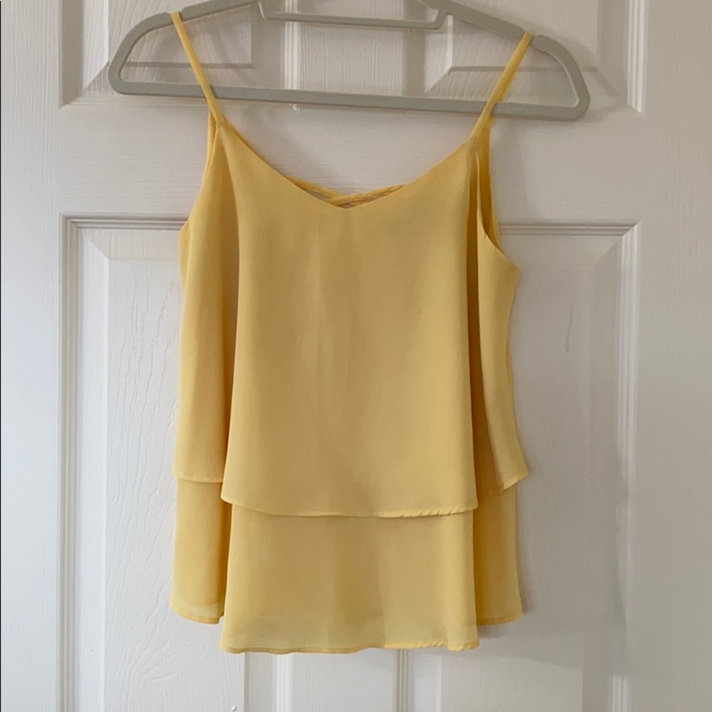 Yellow sleeveless blouse
